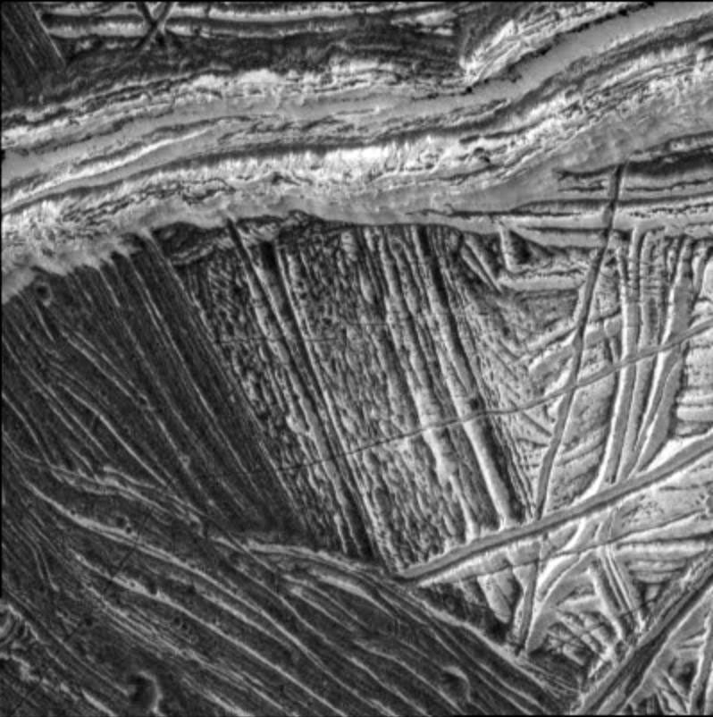 black and white view of rough terrain on an icy surface