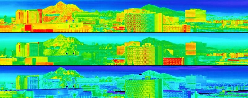 An image showing three strips of the same landscape, each corresponding to a different time of the day, with the colors changing to reflect the buildings heating and cooling down during the day.