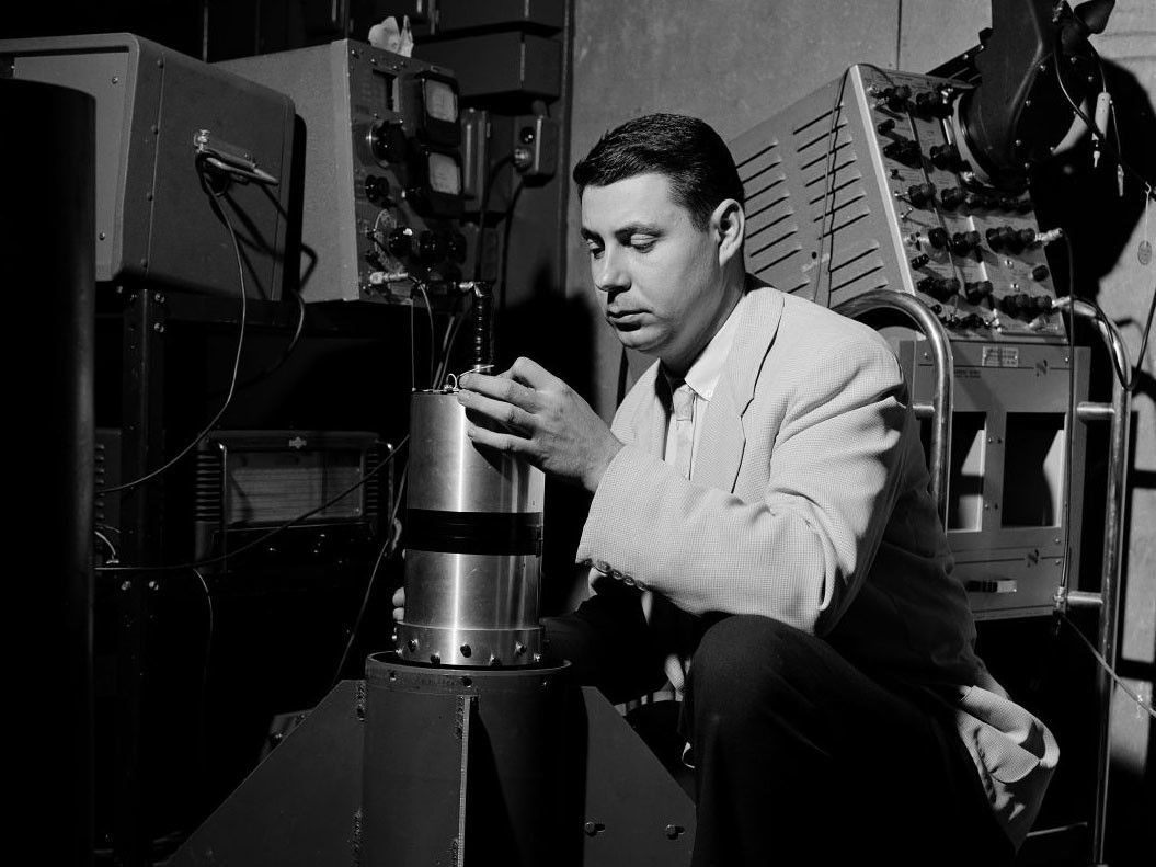 George Ludwig, a graduate student who worked with physicist James Van Allen at the University of Iowa, is seen here testing the Explorer 1 instruments as the satellite was prepared for launch. When the call came to get the materials ready for Explorer 1, Van Allen was conducting experiments in the Antarctic. So Ludwig packed what would become the first U.S. satellite instrument into his car ―along with his pregnant wife and two young children ― and drove the components to the Jet Propulsion Laboratory in Pasadena, California as quickly as possible. The team had only 90 days to prepare for launch.