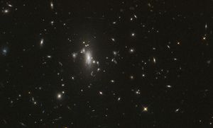 NASA’s Hubble Seeks Lensed Supernova, Marks 200,000 Orbits