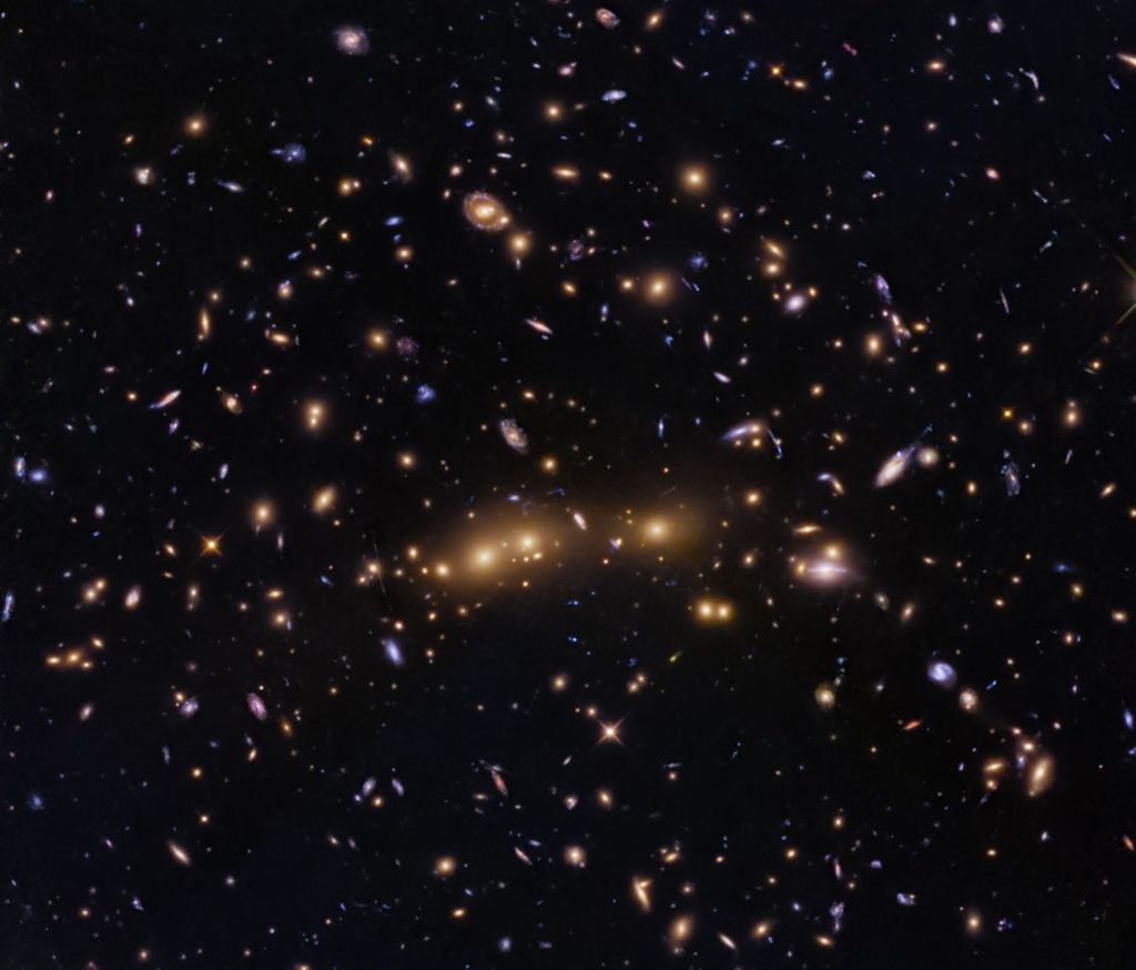 Hubble Glimpses Merging Galaxy Clusters