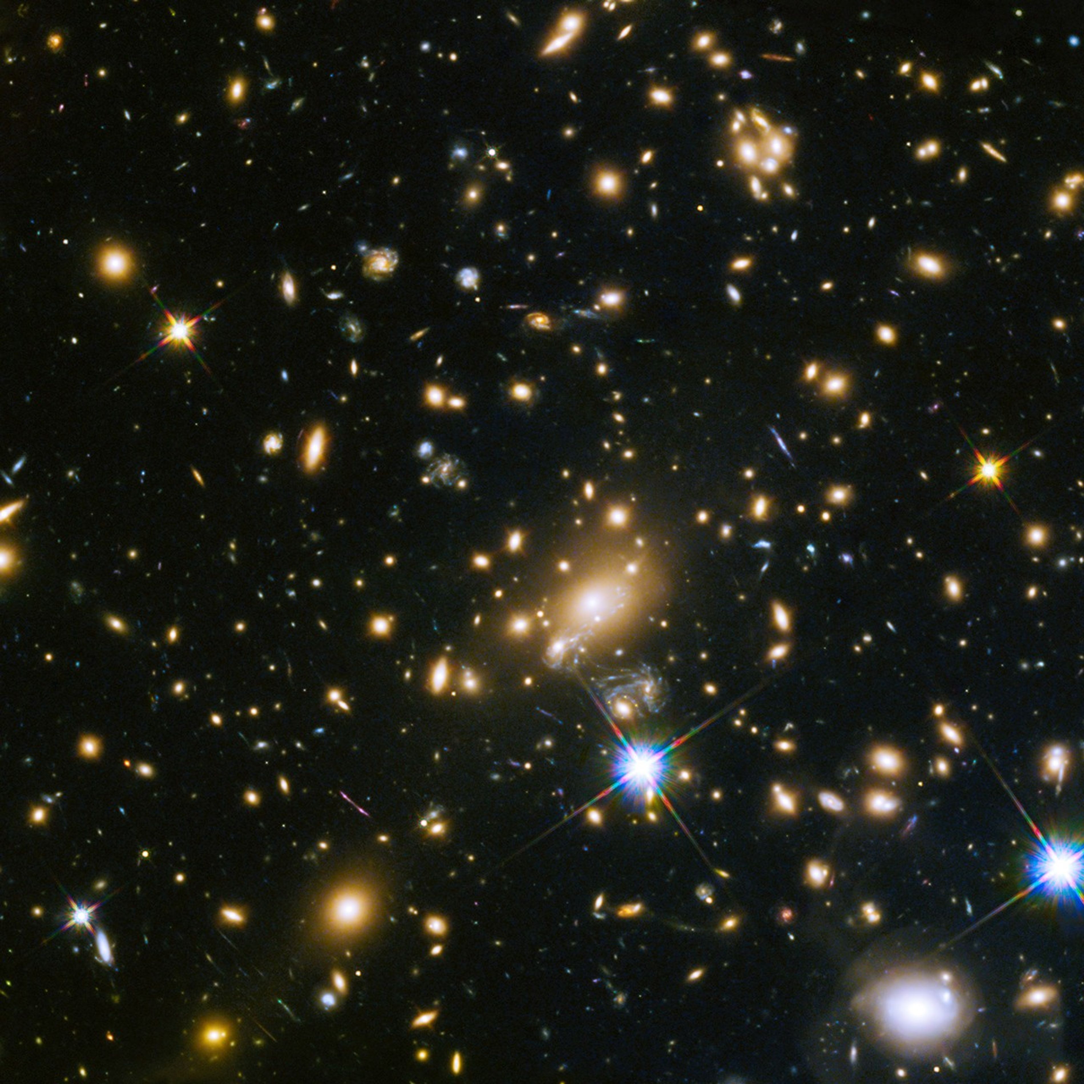 Large sample galaxies of different sizes and shapes, experiencing a lens-like distortion.