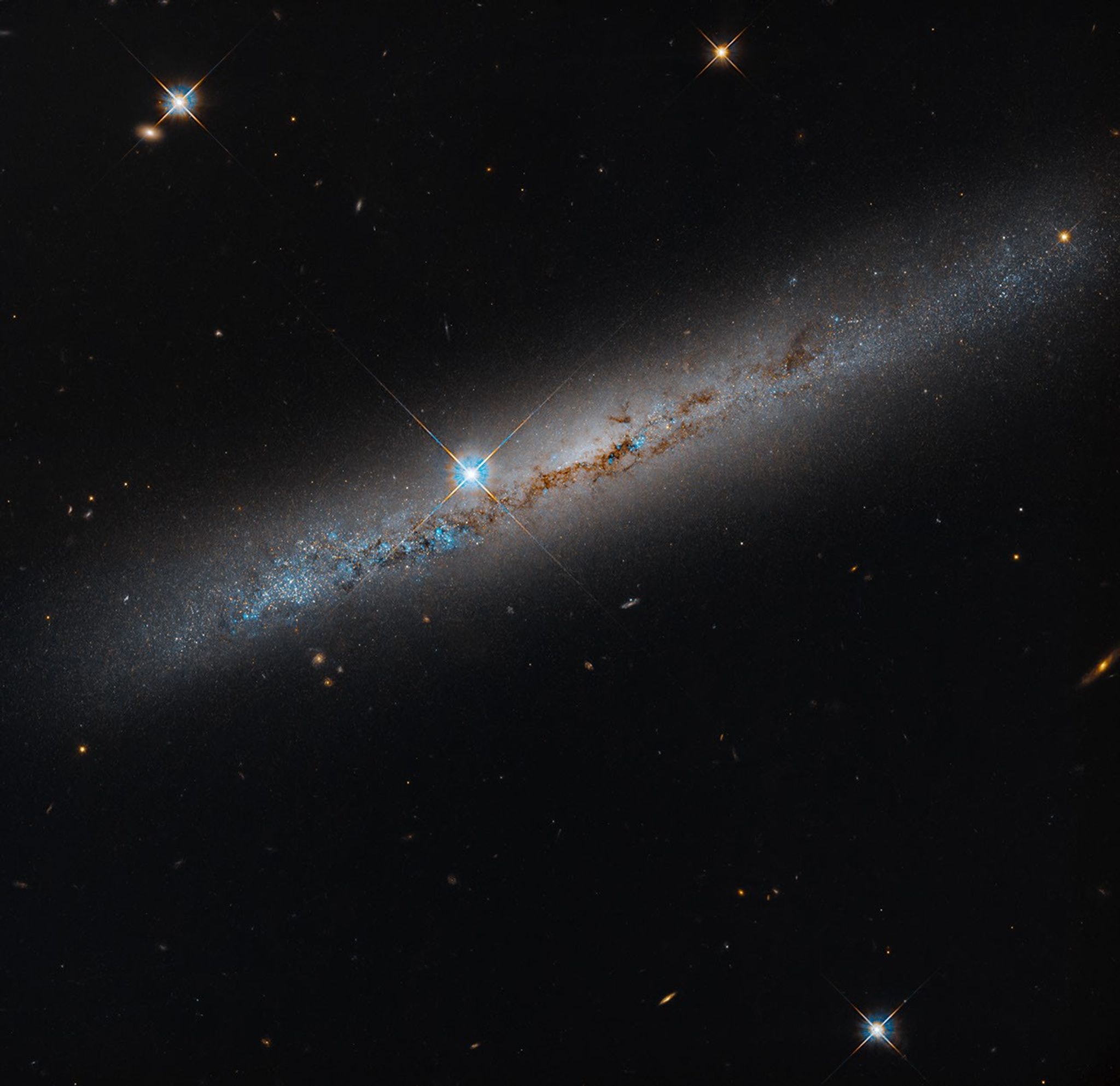 NASA’s Hubble Spies Spiral’s Edge