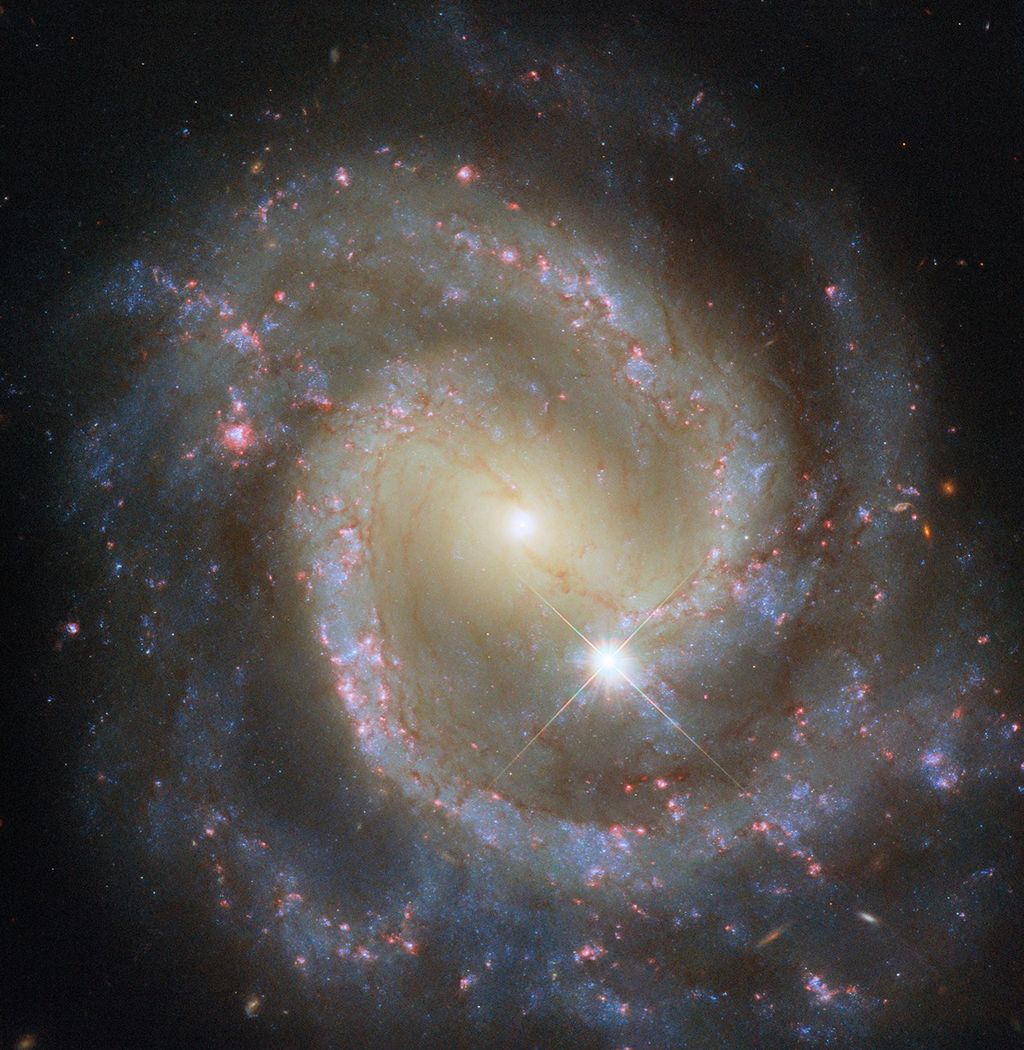 Hubble Spies Paired Pinwheel on Its Own