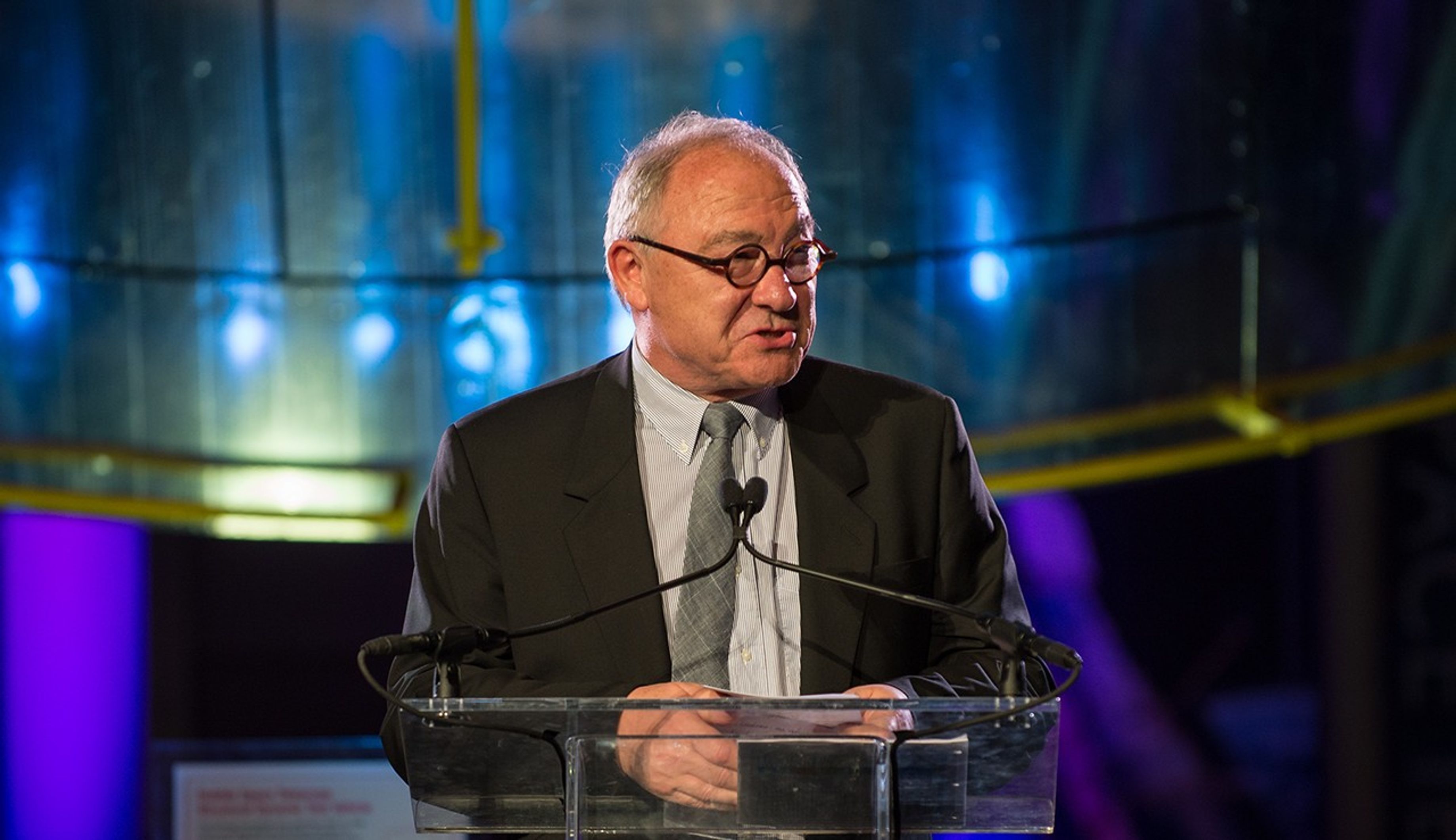 Jean-Jacques Dordain stands at the podium, addressing the audience.