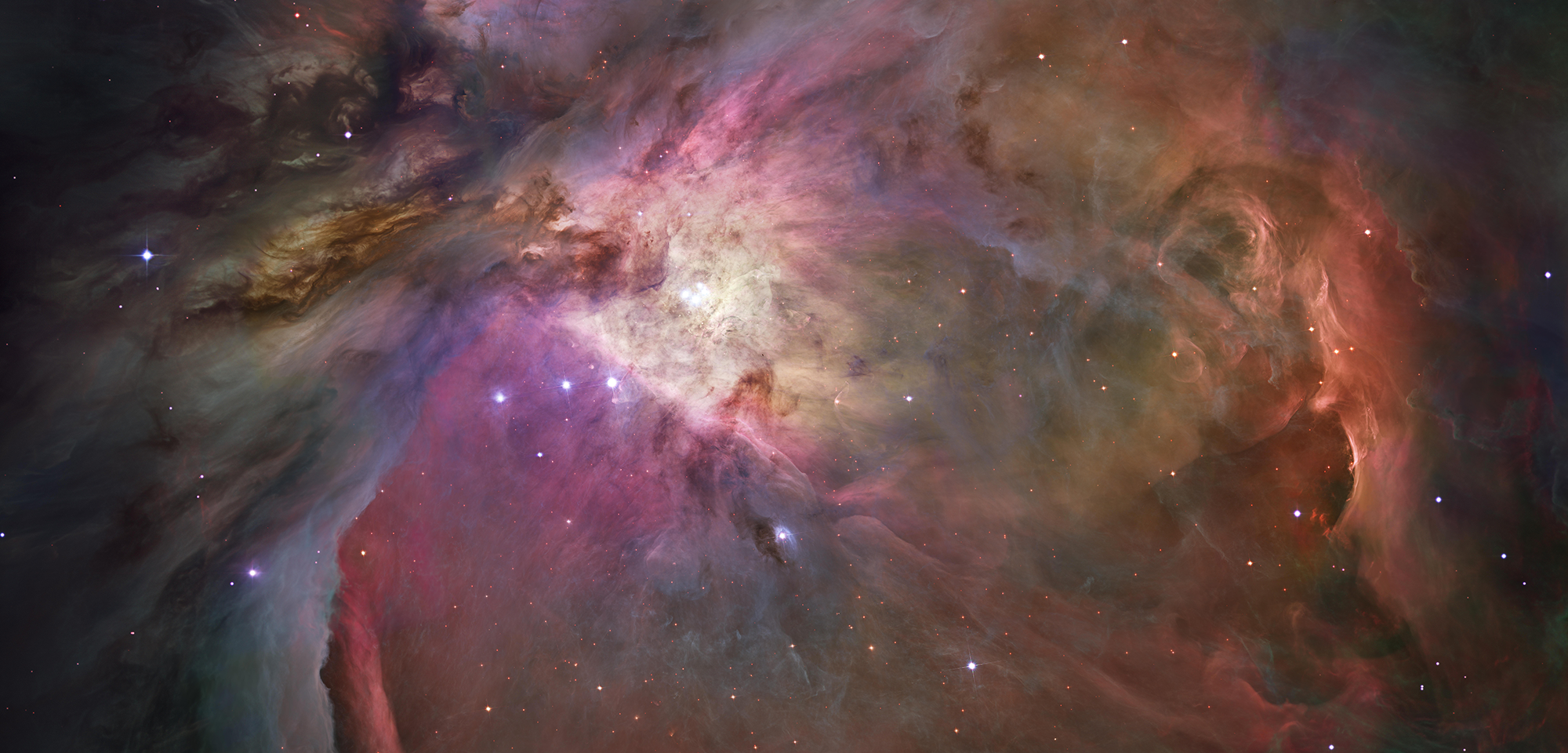 Colorful image of a bright cloud of gas, dust, and stars.