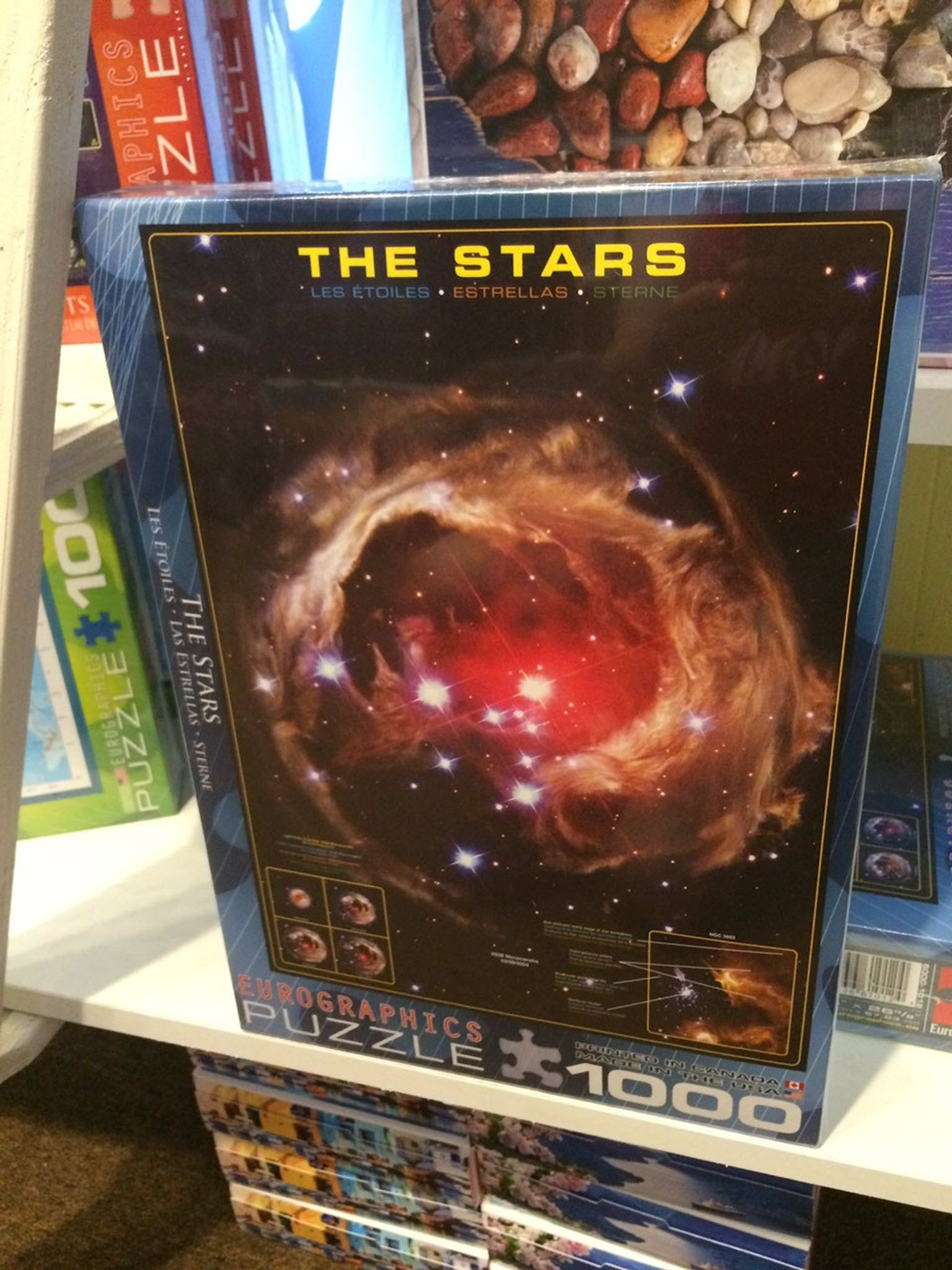 A picture of a box containing a 1,000-piece puzzle called "The Stars"; the picture on the front showing the complete puzzle is the Hubble image of V838 Monocerotis.