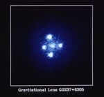 The Gravitational Lens G2237 + 0305