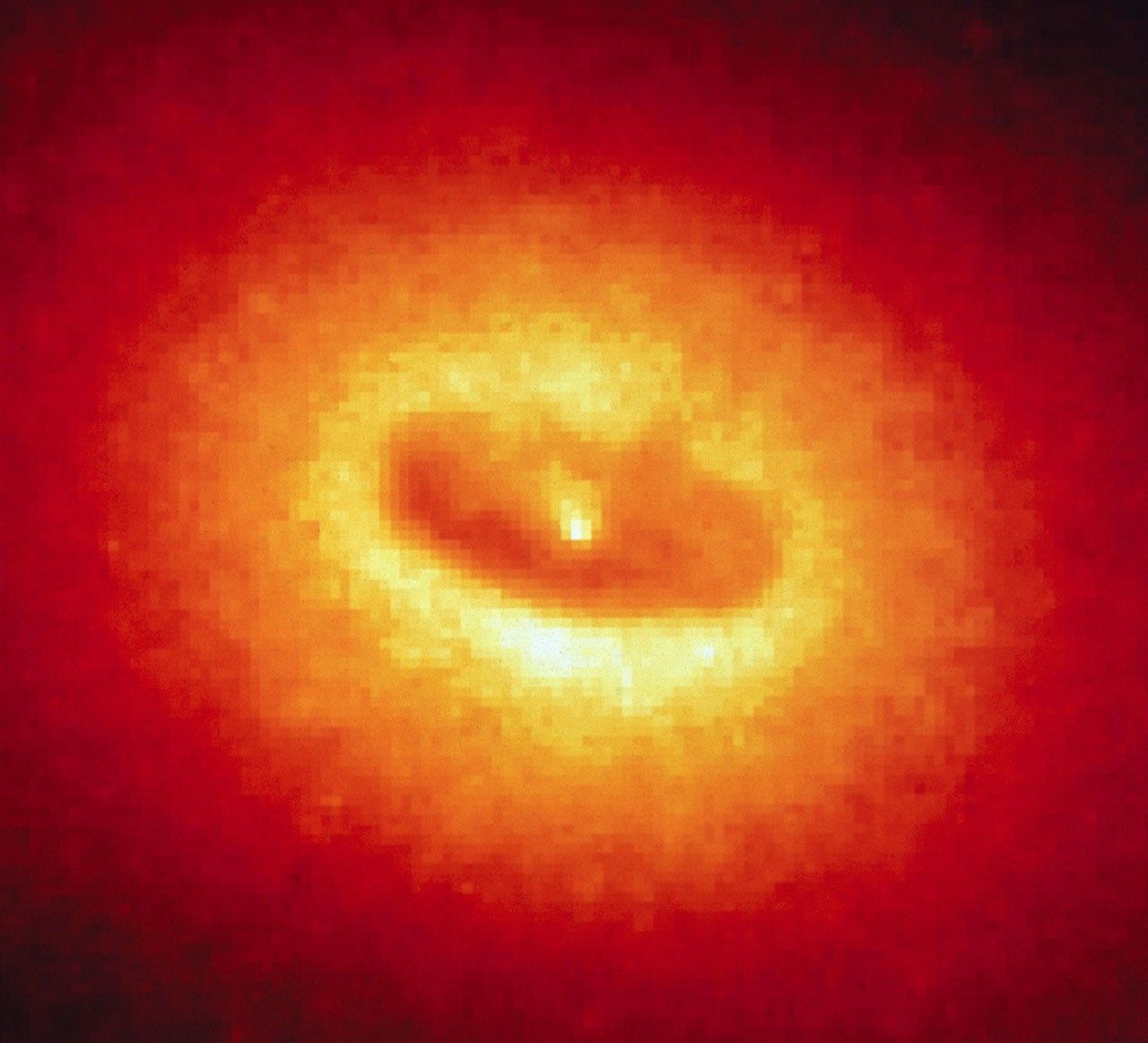 Giant Disk of Cold Gas and Dust Fuels Possible Black Hole at the Core of NGC 4261