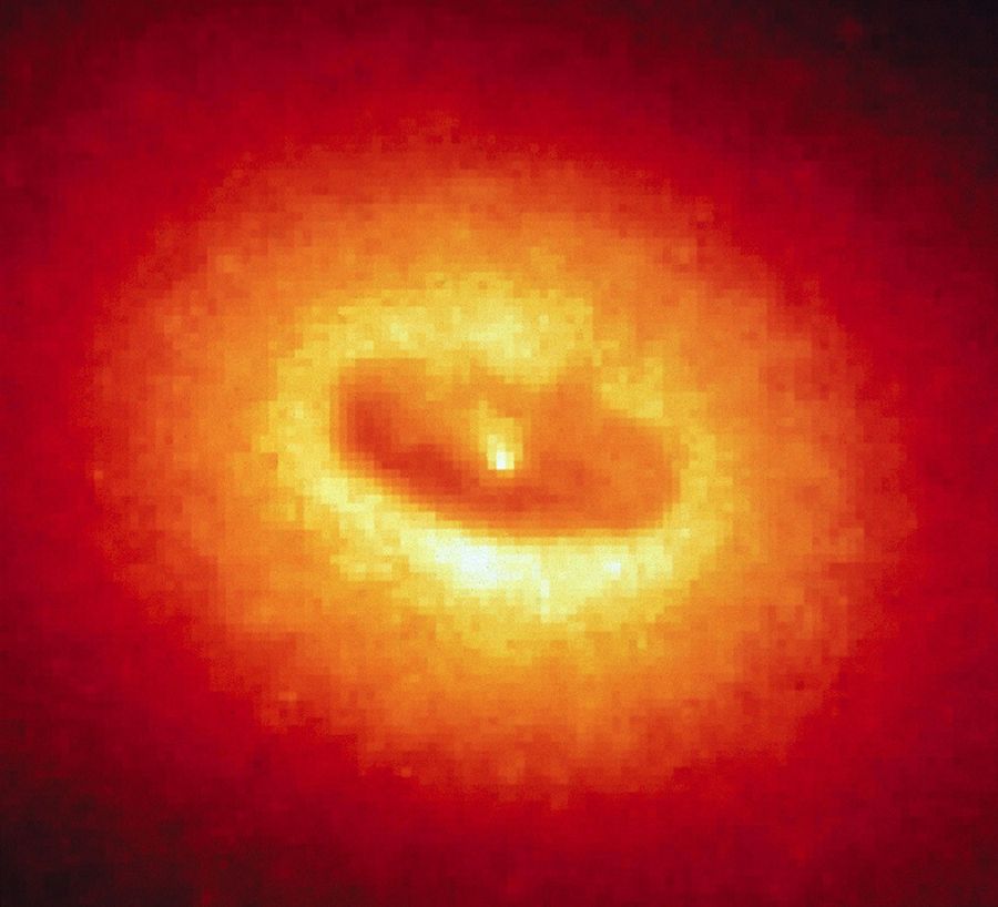 Giant Disk of Cold Gas and Dust Fuels Possible Black Hole at the Core of NGC 4261