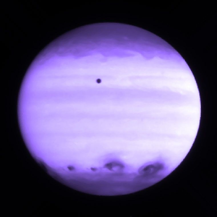 Ultraviolet Image of Multiple Comet Impacts on Jupiter