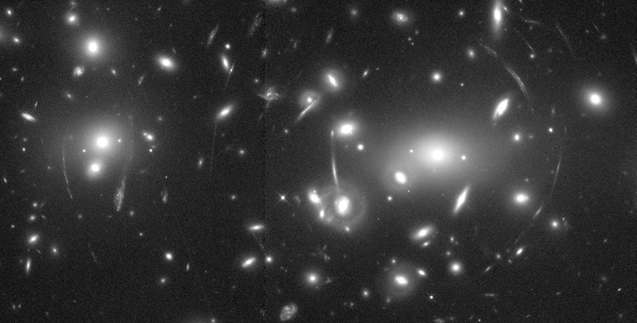 Distant Galaxies of Abell 2218 Viewed Through a Cosmic Lens - NASA Science