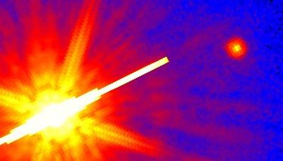 A Really Cool Star: The Dim, Low-Temperature GL 105C