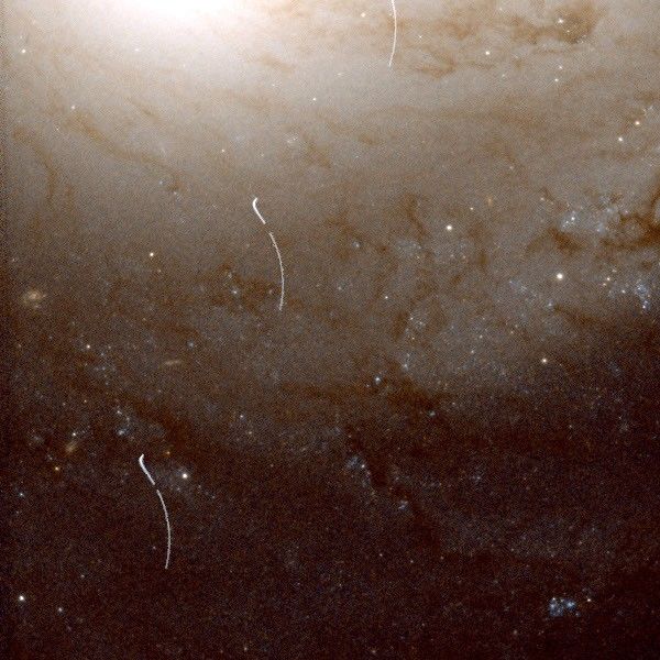 Asteroid Trail Crosses Galaxy NGC 4548