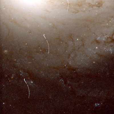 Asteroid Trail Crosses Galaxy NGC 4548