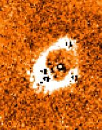 A Stretched Ring of Galactic Light from Quasar PG1115+080 in Infrared