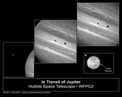 Jupiter’s Moon, Io, Sweeps Across the Planet; Io Volcano Spews Sulfur Dioxide Snow (lower right)