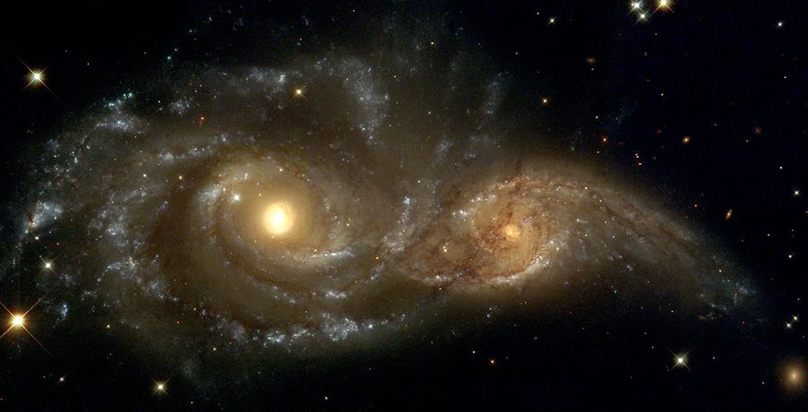 A Grazing Encounter Between Two Spiral Galaxies (NGC 2207 and IC2163)