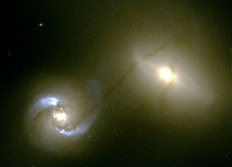 Intergalactic 'Pipeline' Funnels Matter Between Colliding Galaxies NGC 1410 and NGC 1409