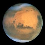 Mars Dust Storm Brews in Hellas Basin and Northern Polar Cap