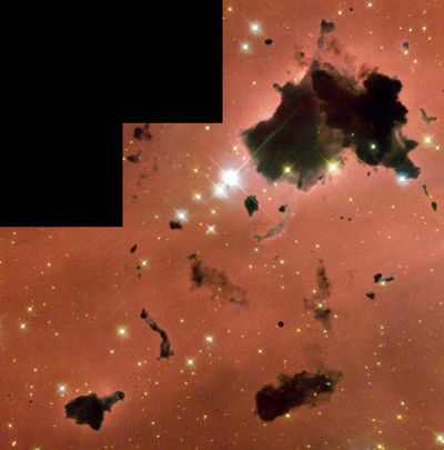Thackeray’s Globules: Dense, Opaque Dust Clouds in Star-Forming Region IC 2944