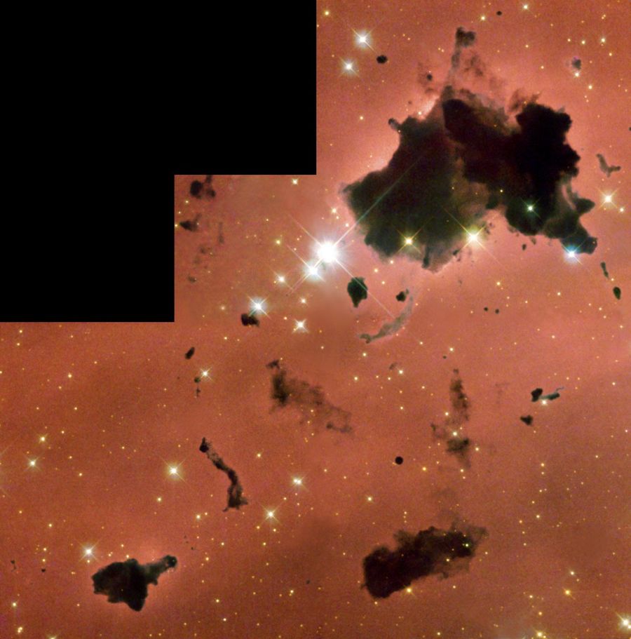Thackeray's Globules: Dense, Opaque Dust Clouds in Star-Forming Region IC 2944