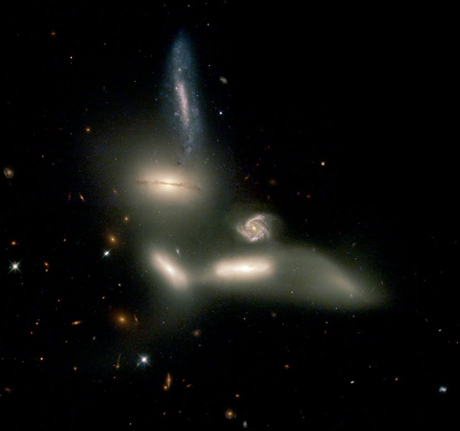 Seyfert's Sextet: Four Colliding Galaxies, and Two Bystanders