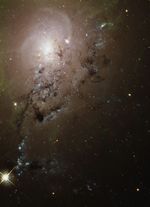 Freewheeling Galaxies Collide in a Blaze of Star Birth (NGC 1275)