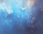 Bright, light blue image has trails like falling raindrops.