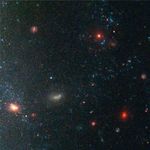 Star Clusters and Distant, Red Galaxies Near Edge of Galaxy NGC 3370