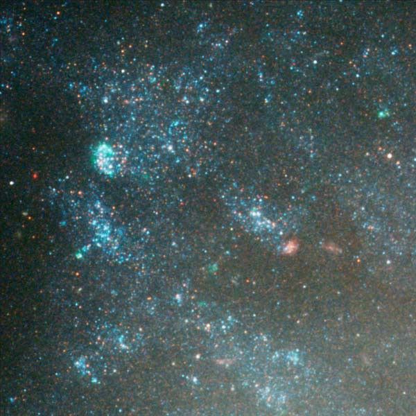 Blue Star Clusters and Distant Galaxies Near Edge of Galaxy NGC 3370