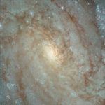 Center of Galaxy NGC 3370 Shows Dust Lanes and Uncommonly Ill-Defined Nucleus