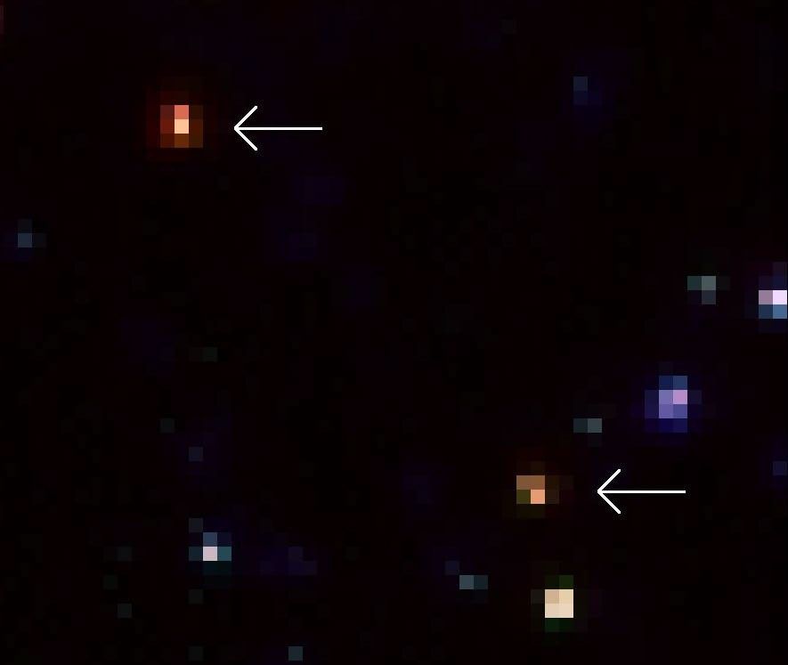 A Close-Up Look of Two of the Extremely Red Galaxies Revealed By Spitzer
