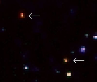 A Close-Up Look of Two of the Extremely Red Galaxies Revealed By Spitzer