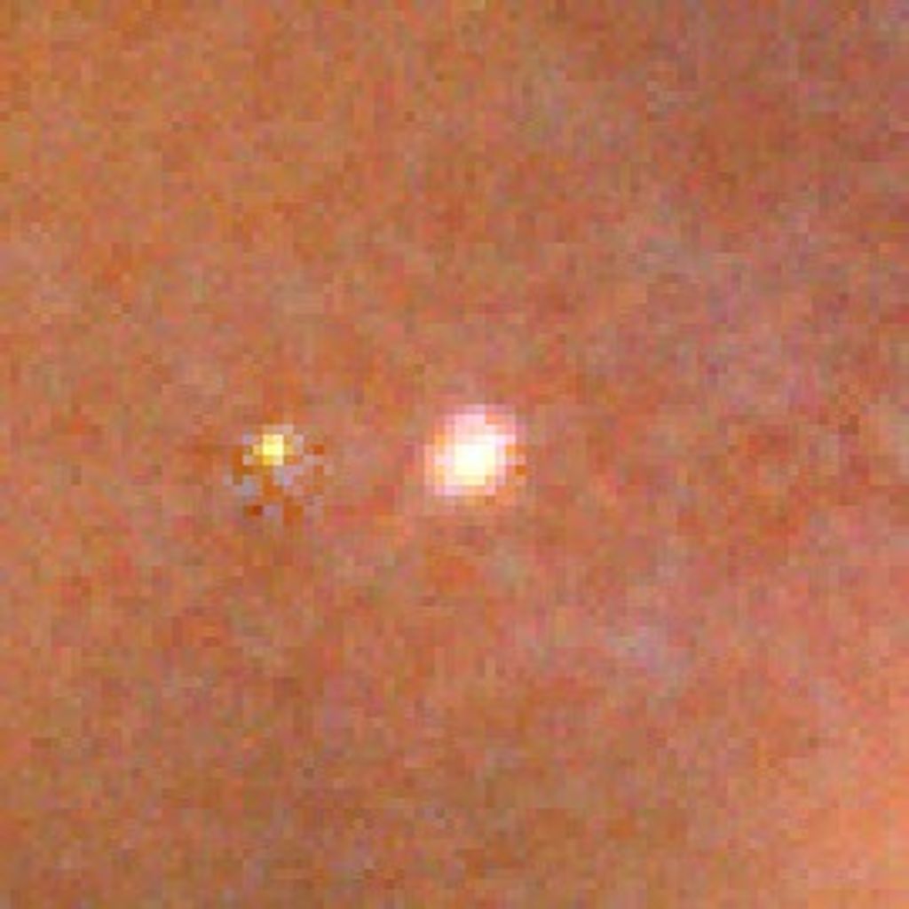 New Hubble Image Reveals Details in the Heart of the Trifid Nebula ...