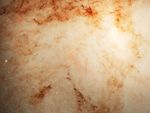 Dusty wisps in shades of orange and red on a mostly opaque beige background.