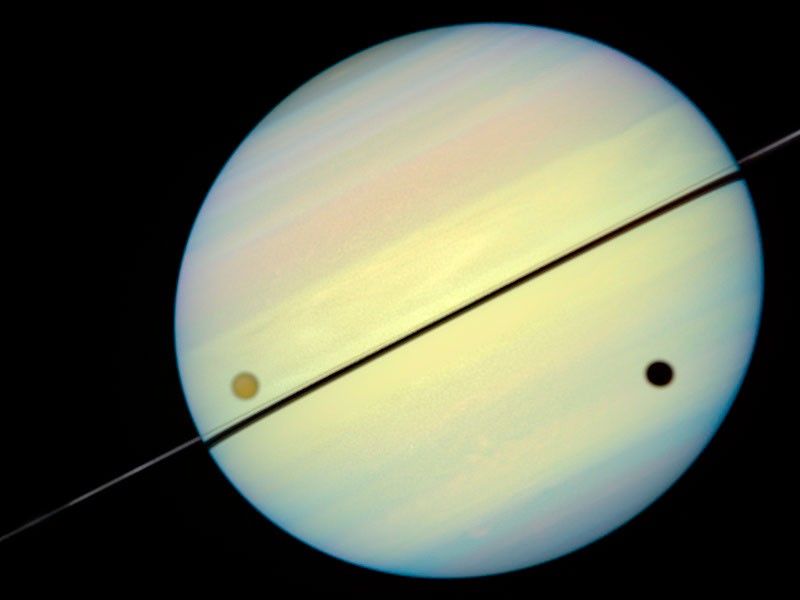 Hubble Catches Titan Chasing Its Shadow - Frame 4