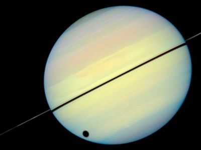 Hubble Catches Titan Chasing Its Shadow – Frame 2