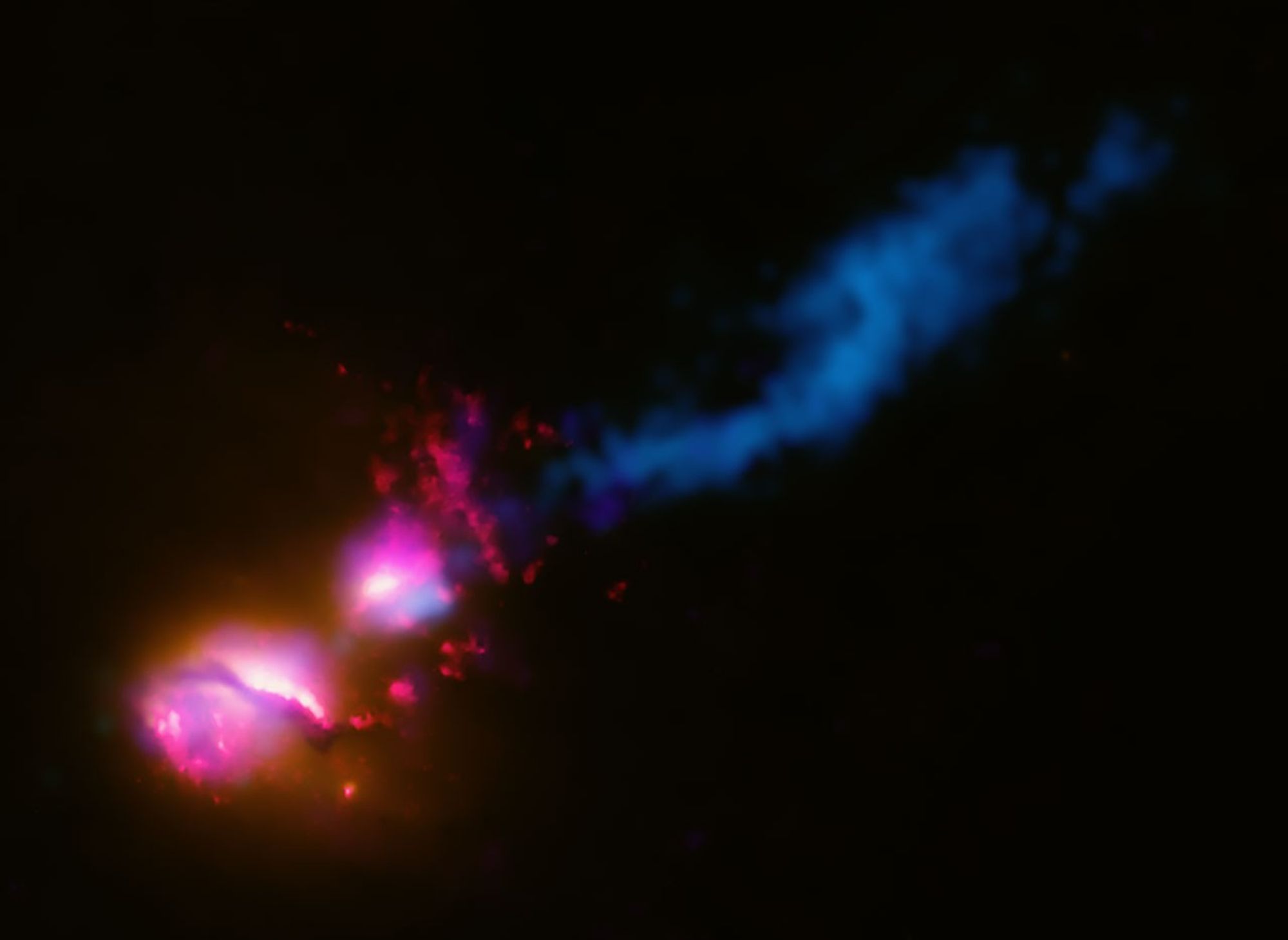 3C 321: Galaxy Fires at Neighboring Galaxy