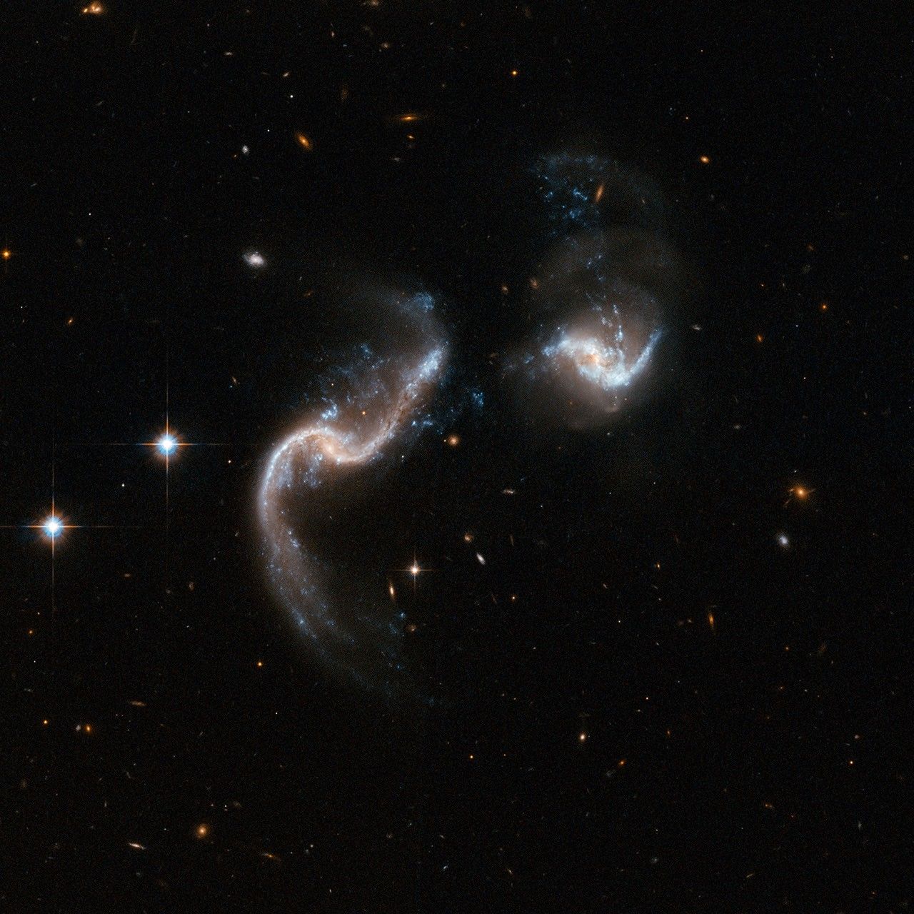 Hubble Interacting Galaxy Arp 256