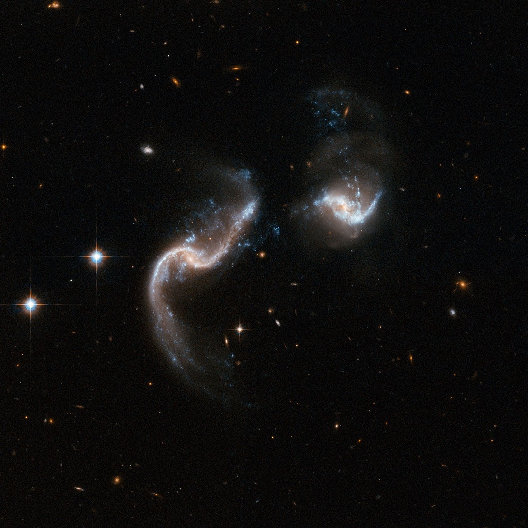 Hubble Interacting Galaxy Arp 256