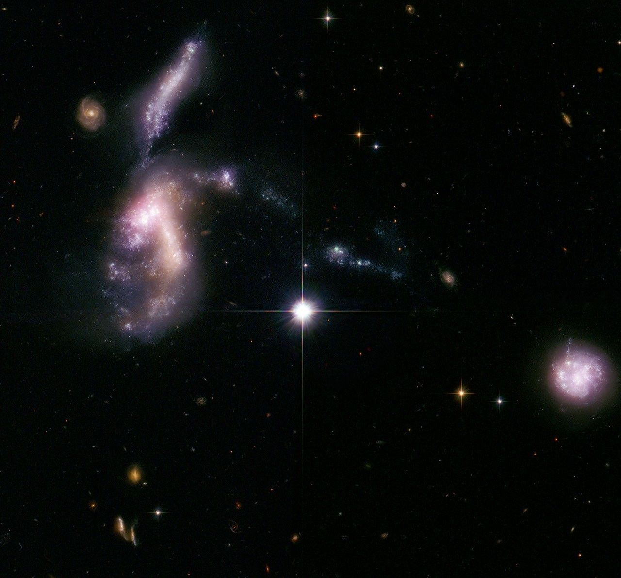 Hickson Compact Group 31: Interacting Galaxies Aglow with Millions of Young Stars