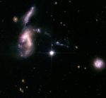 Hickson Compact Group 31: Interacting Galaxies Aglow with Millions of Young Stars