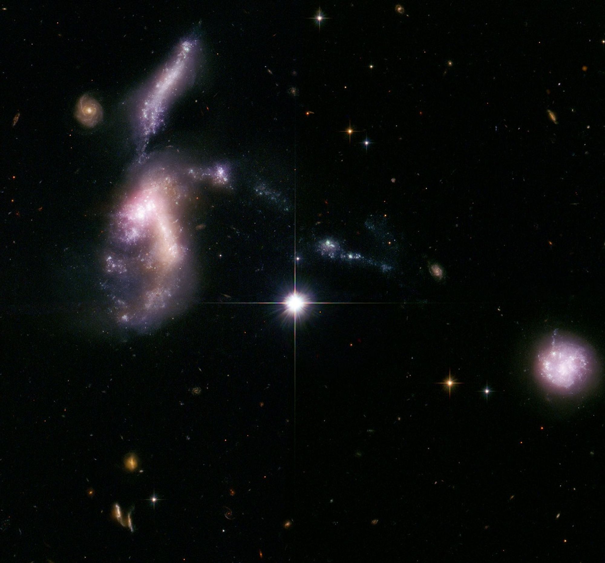 Hickson Compact Group 31: Interacting Galaxies Aglow with Millions of Young Stars