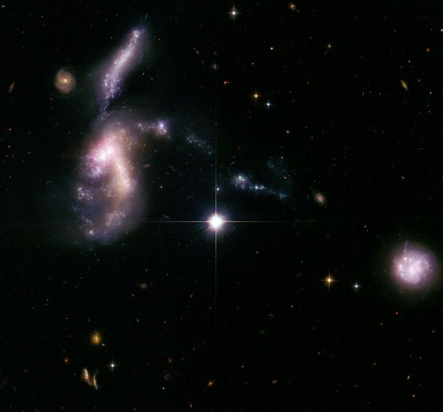 Hickson Compact Group 31: Interacting Galaxies Aglow with Millions of Young Stars
