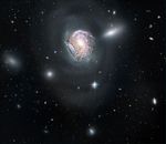 Spiral Galaxy NGC 4911 in the Coma Cluster