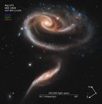 Image titled “Arp 273, UGC 1810, HST WFC3/UVIS” with compass arrows, scale bar, and color key.