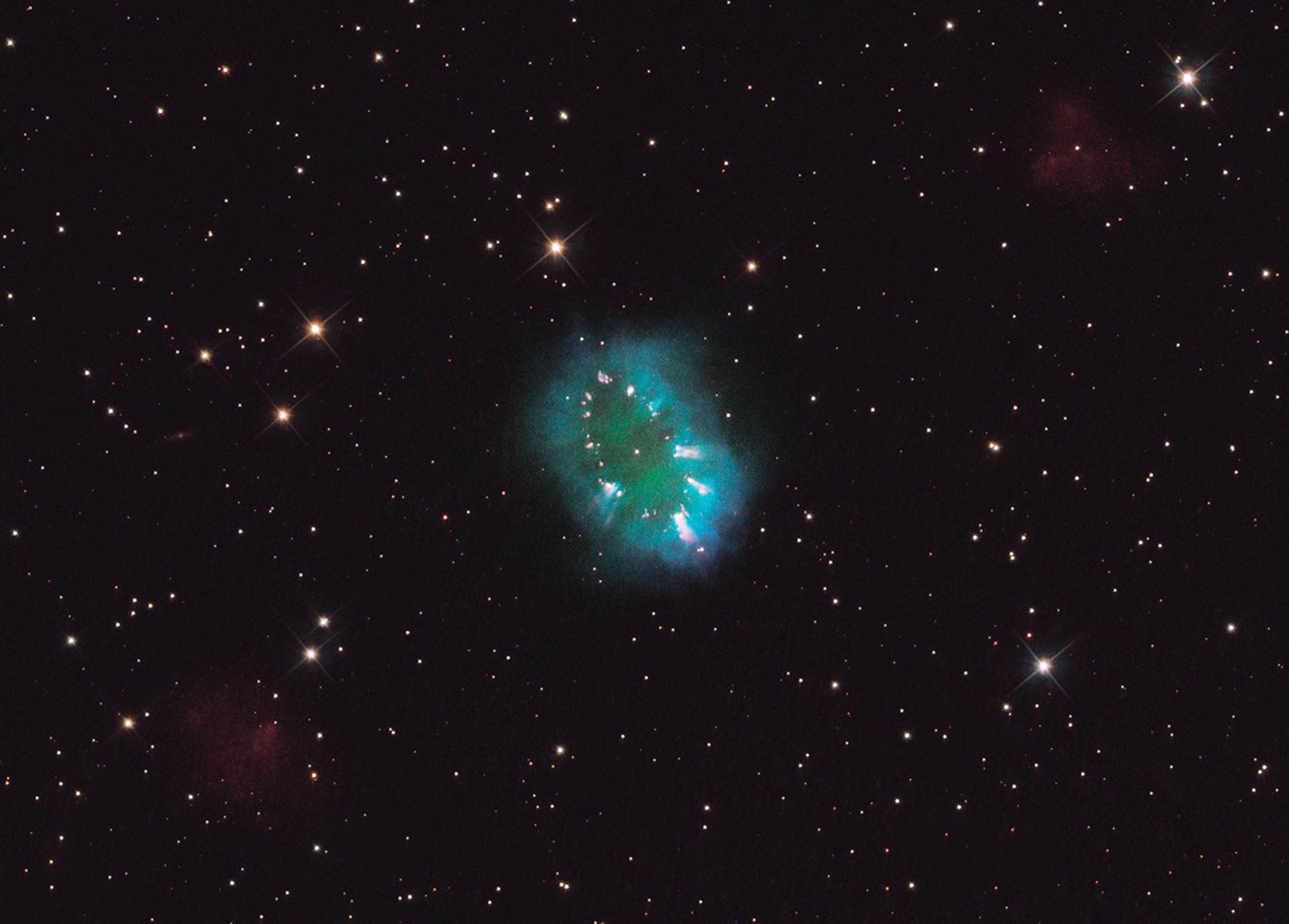 A Cosmic Necklace Larger than a Solar System