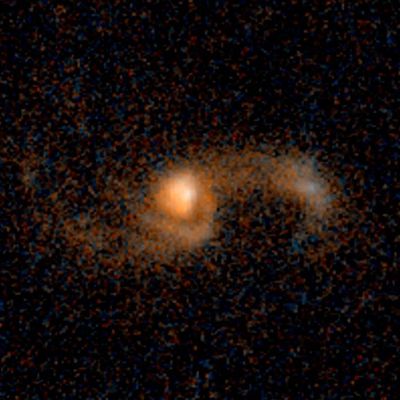 Merging Galaxies – 5.3 Billion Light-Years from Earth