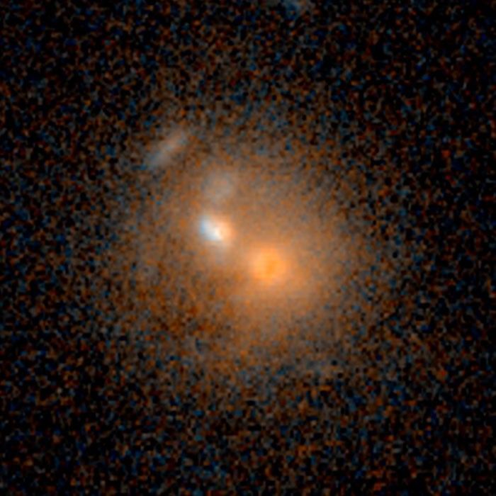 Merging Galaxies - 3 Billion Light-Years from Earth